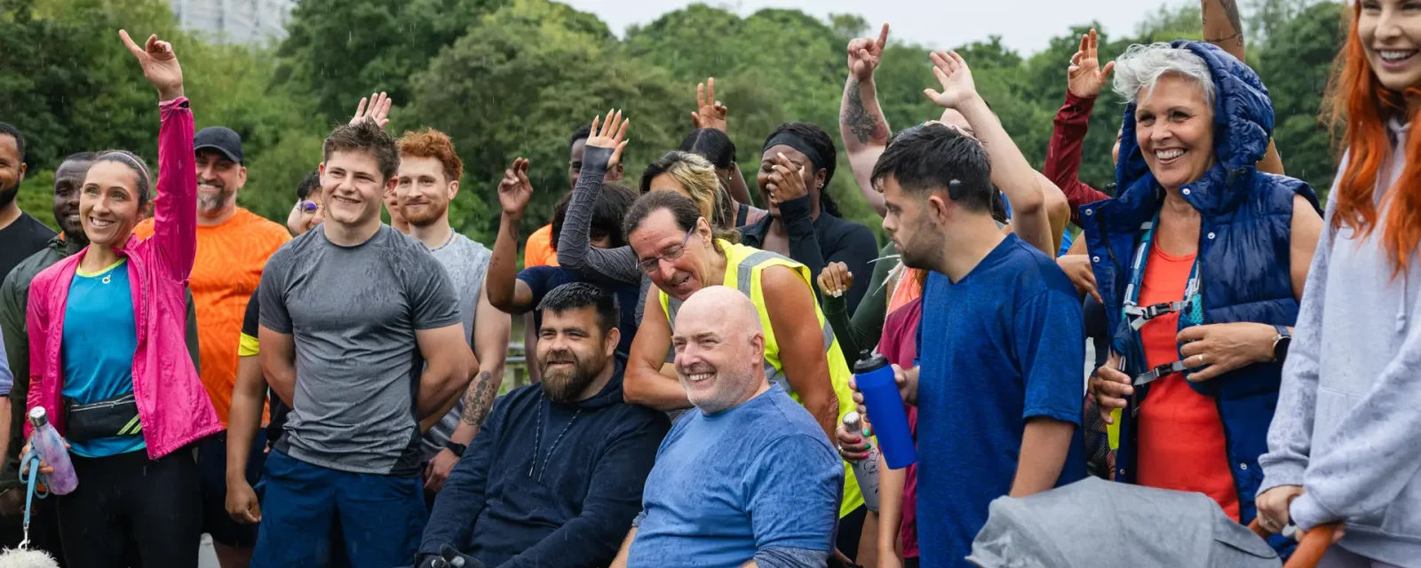 Group of run participants taking part in a fun run in Leazes Park in Newcastle upon Tyne in the North East of England. The race is open to people of all ages and abilities and is also dog friendly.